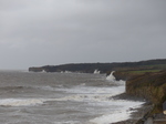 LZ00617 Waves crashing against cliffs at Llantwit Major beach.jpg